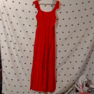 Tangerine prairie style maxi dress with tie waist and cap ruffle sleeves. Xl